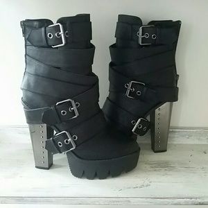 Black booties with silver heel