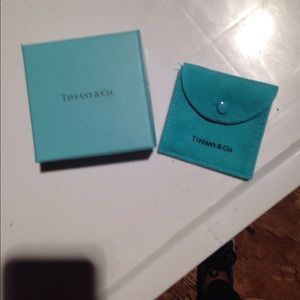 Empty Tiffany box with jewelry bag