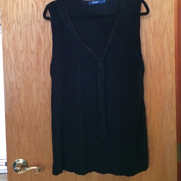 Black top w/ sheer panel at chest with sequin tie. - Picture 1 of 4