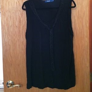 Black top w/ sheer panel at chest with sequin tie.