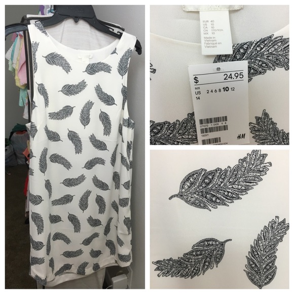 Shape shift feather dress NWT