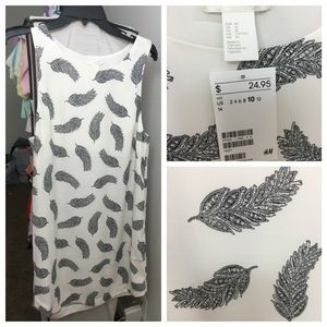 Shape shift feather dress NWT