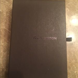 LV box with cloth pouch holds a big LV wallet