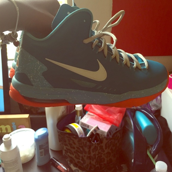 Blue and orange KDs .