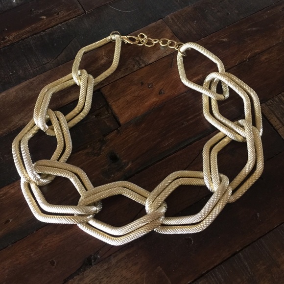 Gold colored chain chunky necklace.