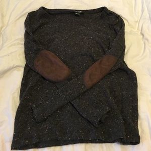 Sweater shirt with elbow patches.