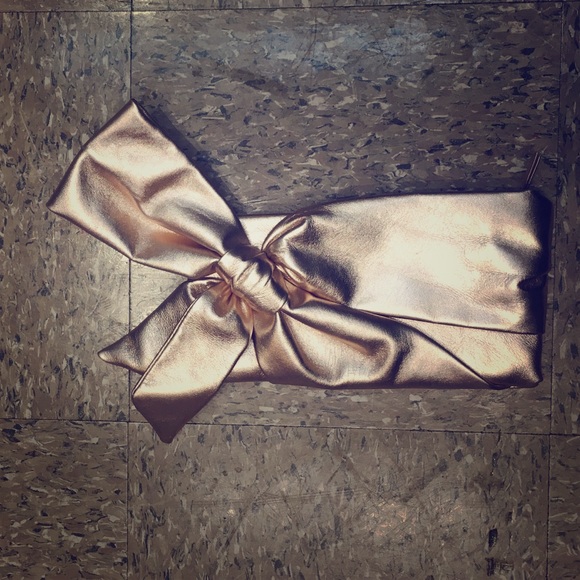 Valentino metallic pink bow clutch