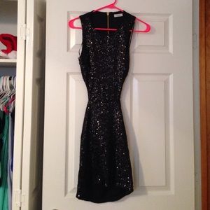 Backless metallic black dress