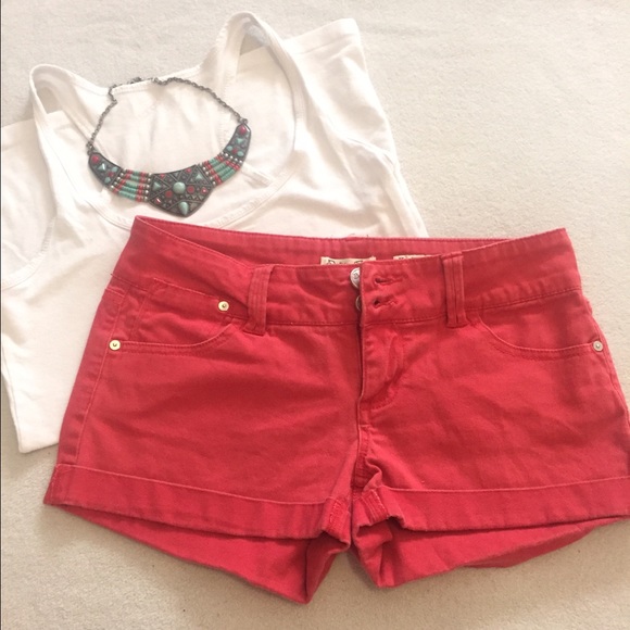 Orange/ red shorts