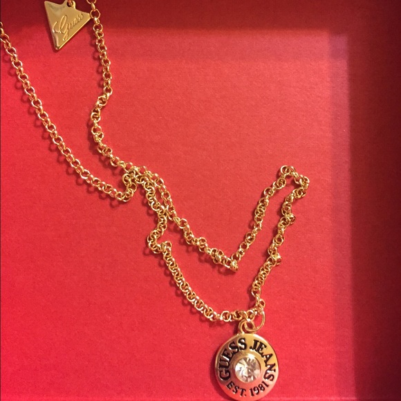 Jewelry - GUESS Necklace button charm GUESS logo.