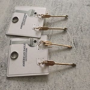 Two pairs of gold Arrow earrings