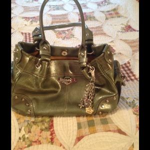 Olive green Kathy Van Zeeland four poster purse
