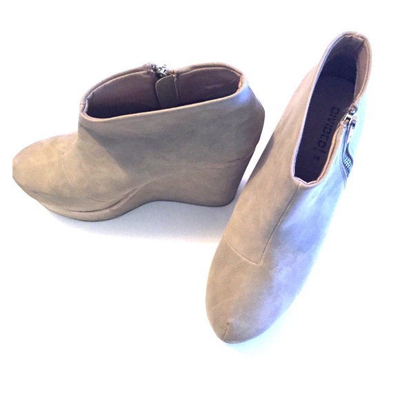 Taupe platform boots.