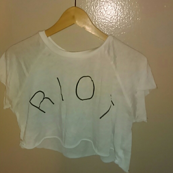 White crop top with the words RIOT