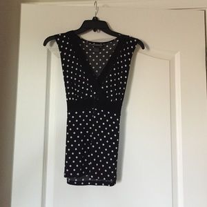 Black and white polkadot blouse