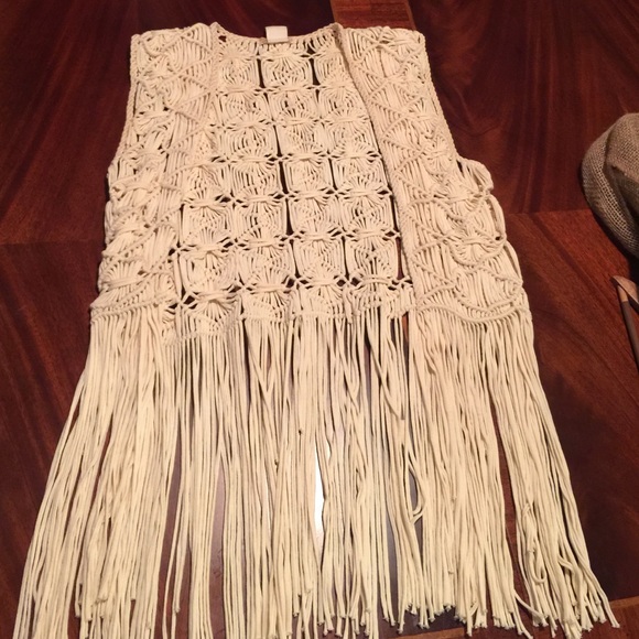 Knitted cream colored vest