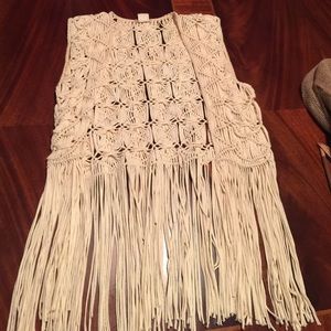 Knitted cream colored vest