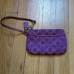 LIKE NEW Purple coach wristlet