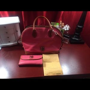 Pink Dooney & Bourke Purse with matching wallet.
