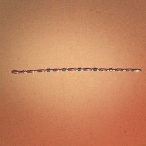 10K gold genuine emerald and diamond bracelet.