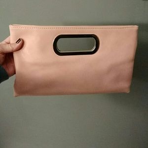 Blush clutch with optional gold chain strap