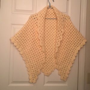 Hand knitted shawl.