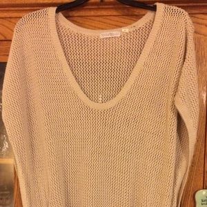 Ladies RipCurl sweater with waist pull tie.