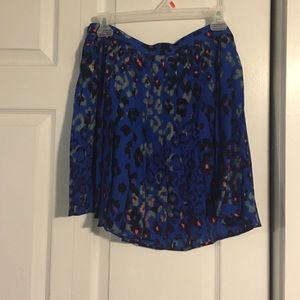 Blue skirt with colorful leopard print spots