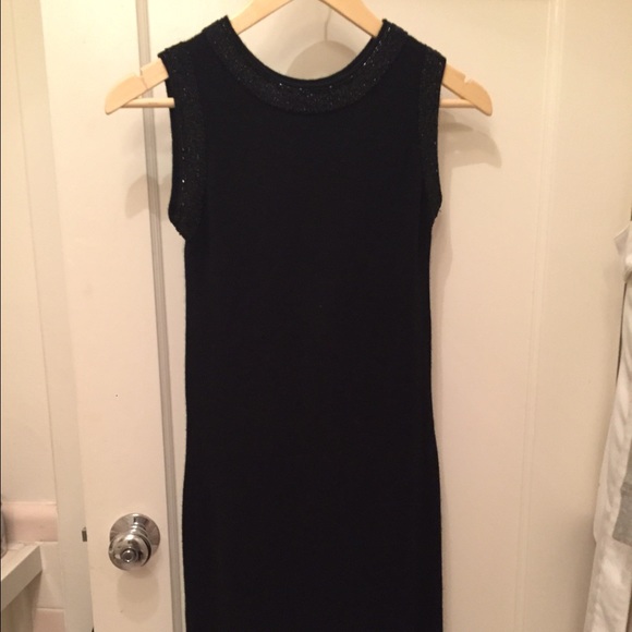 Black cashmere sleeveless shift dress.