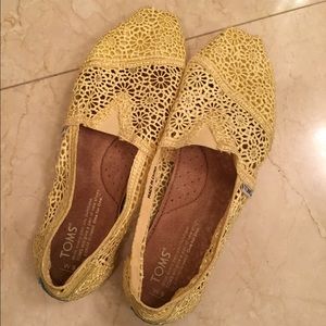 TOMS Women's yellow crochet slip-ons