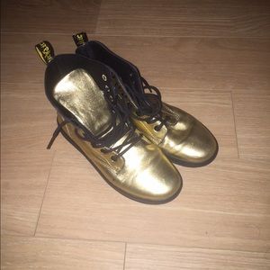 Gold Dr.Martens sneakers
