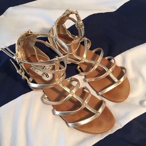 Gold gladiator sandals