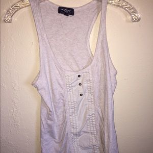Cream colored. Silver tank top