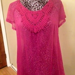 Pink sheet top with crochet design
