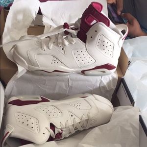 Maroon and white Jordan 6s