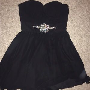 Worn once good condition black with zip up back