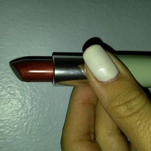 Never used Clinique Lipstick in color Sassy Spice