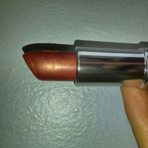 Never used Clinique Lipstick in color Think Bronze