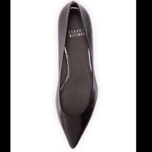 Black leather pointy shoes