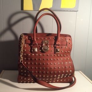 29% off Handbags - Cute Studded Lionel Handbag from Sarah&#39;s closet on Poshmark