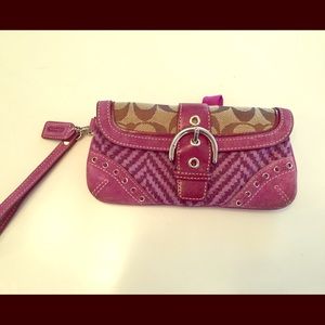 Little purple coach wrist clutch