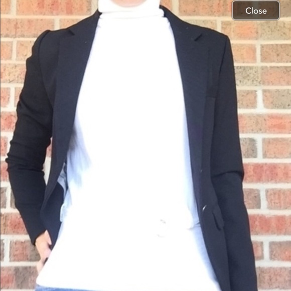 White Sleeveless Turtleneck