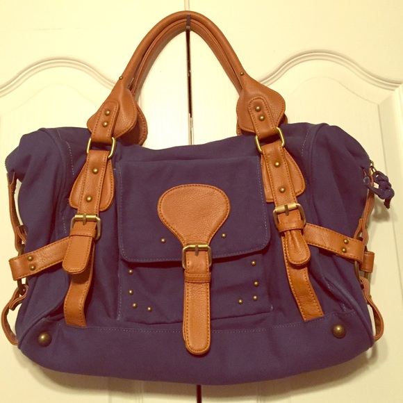 URBAN OUTFITTERS Blue purse with cognac details