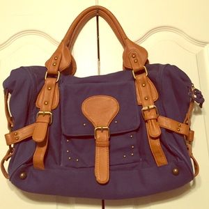 URBAN OUTFITTERS Blue purse with cognac details
