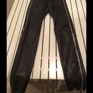 VINCE. Leather leggings with side zipper detail.