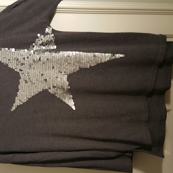 Great sweater with sequin star on front