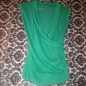 Deep plunge turquoise blouse