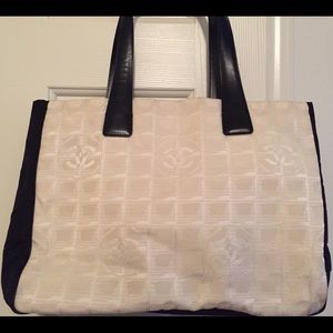 Authentic Chanel travel line beige tote hand bag