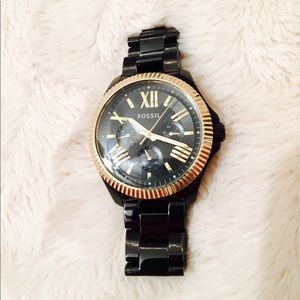 Black and Gold Fossil watch