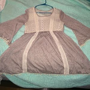 Boutique tunic with lace and Pom poms